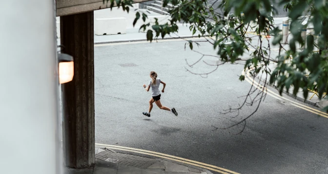 Photo of running woman