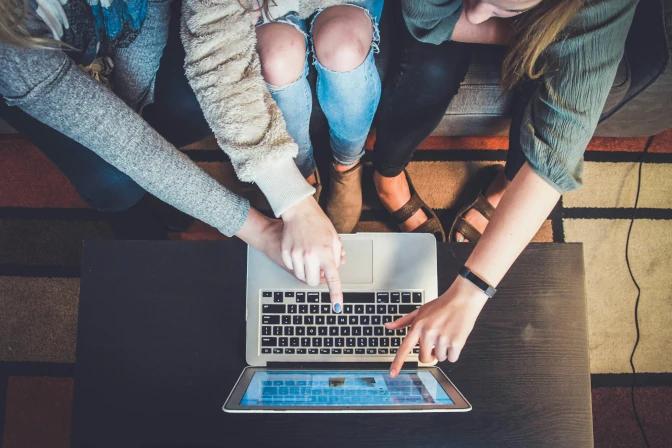 Photo of people shopping online